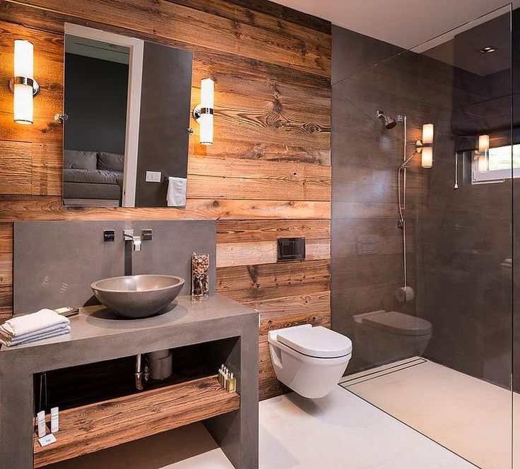 Wooden wall in the loft style bathroom