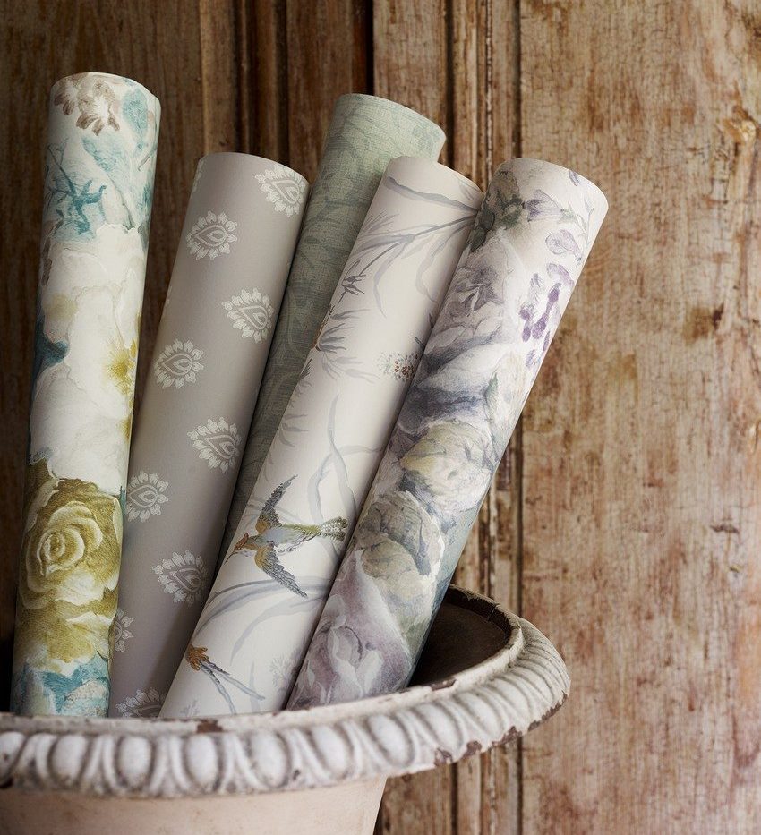 Rolls of different wallpapers for decorating a bedroom with your own hands