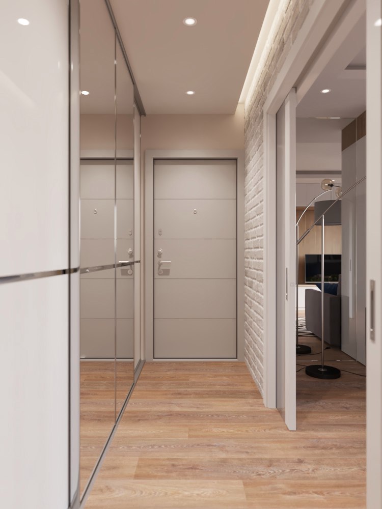 Mirrored cabinet doors in a beige hallway