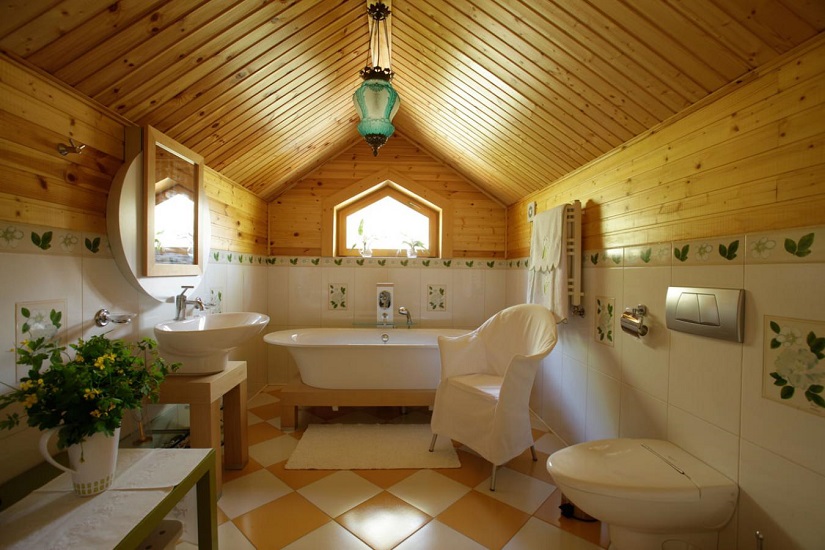 Spacious bathroom in a wooden house