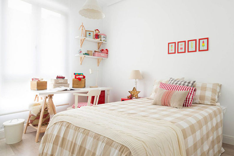 Checkered bedspread on a baby bed