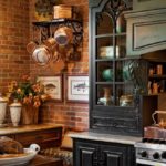 Black retro cupboard in a rustic kitchen