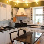 Lighting in the kitchen with corner set
