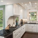 Wooden facades of a classic style kitchen unit