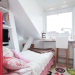 The arrangement of a small bedroom in the attic