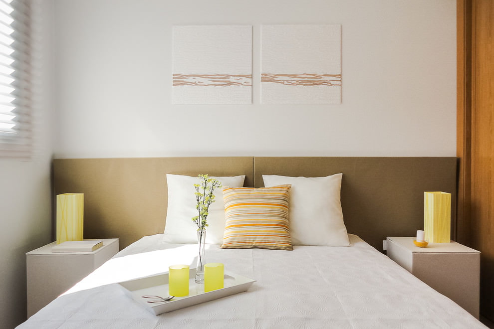 Modular paintings in a minimalist style bedroom
