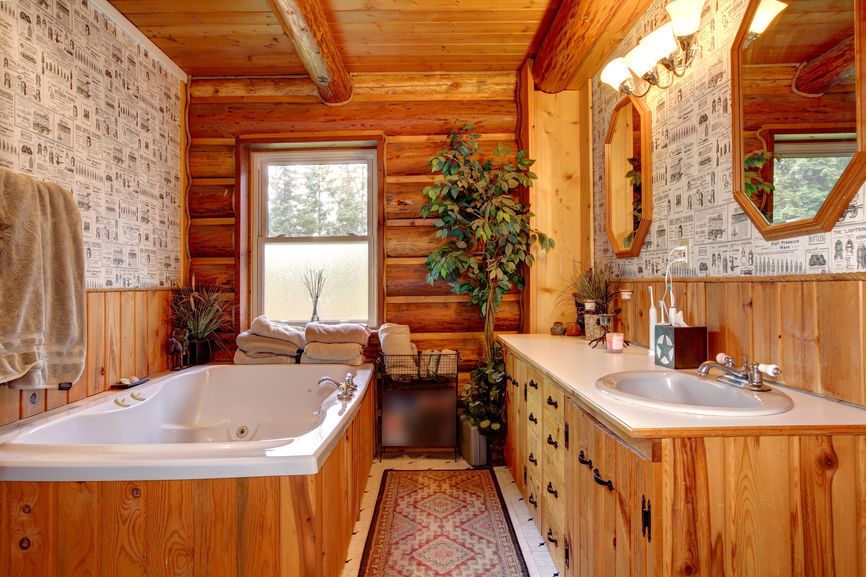 Narrow bathroom in a wooden house