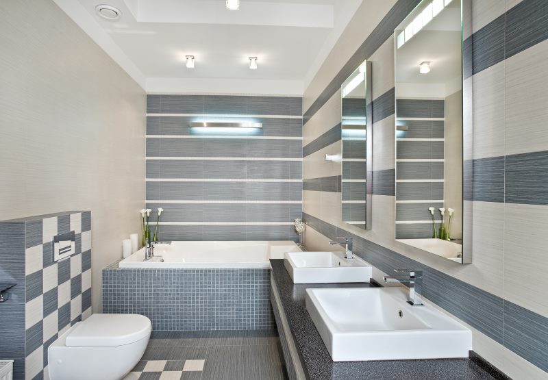 Interior of a bright bathroom with two washbasins