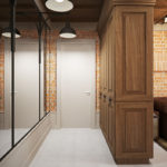 Wooden wardrobe between the living room and hallway