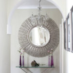 Glass chandelier in the hallway interior