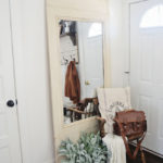 Stylish mirror in the hallway of an apartment of a young girl