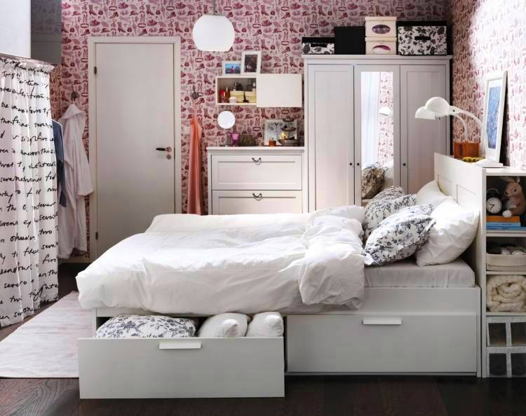White bed with drawers in the bedroom with an area of ​​10 squares
