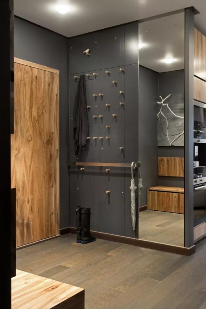 Gray wardrobe with hooks for outerwear