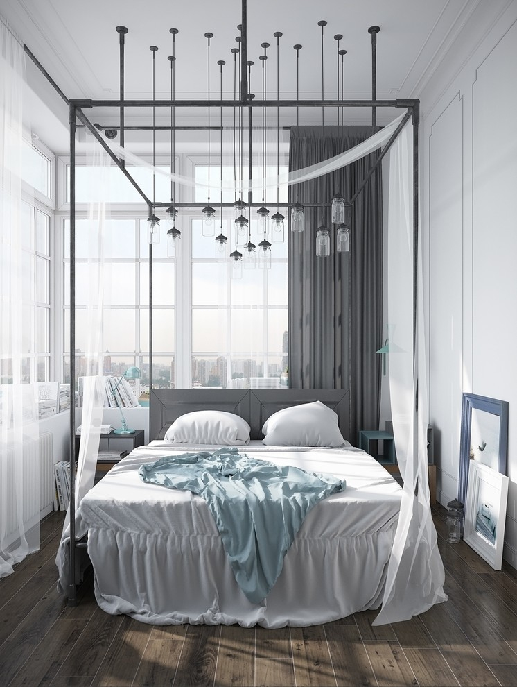 Interior of a small bedroom with panoramic windows