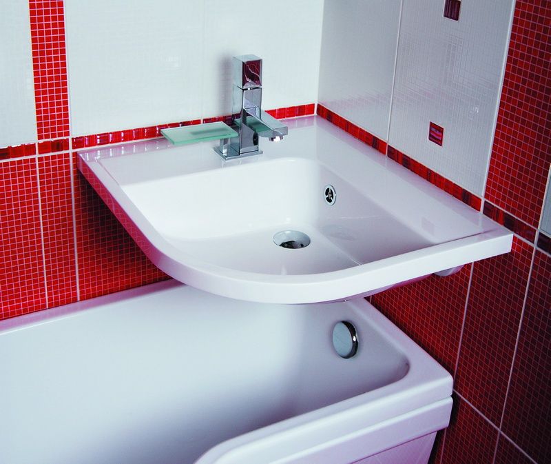 Corner sink over acrylic bathtub