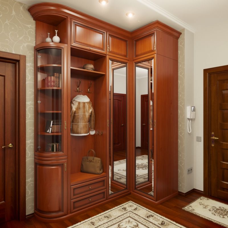Corner wardrobe in the hallway of the classic style