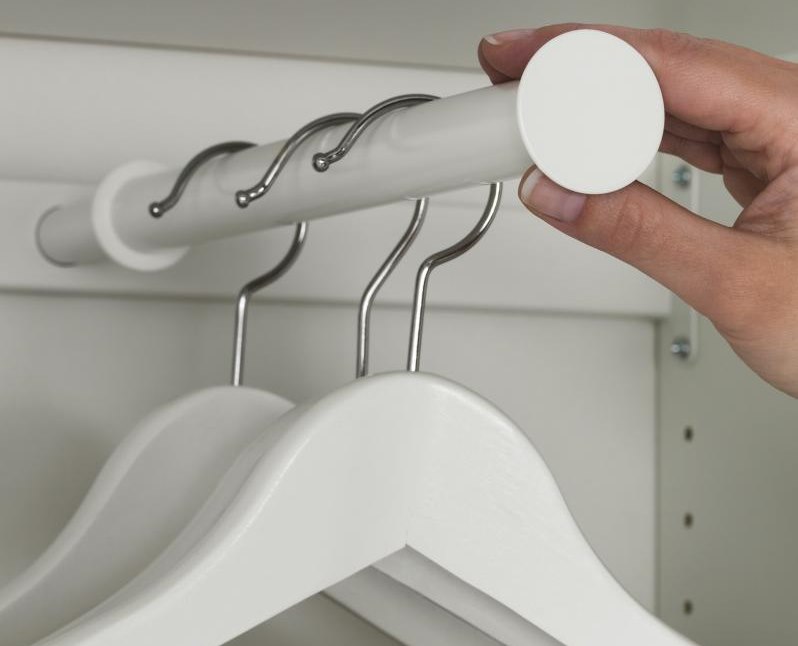 Placement of clothes hangers inside a narrow cabinet