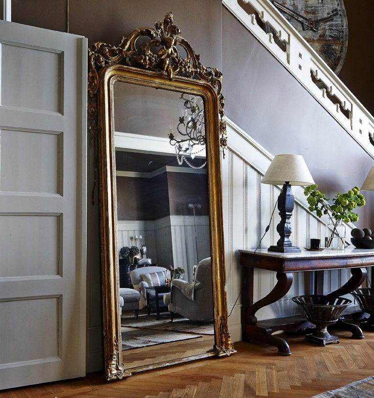 Gorgeous mirror in the hallway with stairs