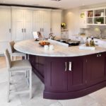 Modern kitchen with purple island.
