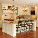 Two wire chandeliers over the kitchen island