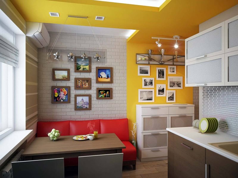 Sarı bir duvar ile mutfakta kırmızı döşeme ile düz dar kanepe