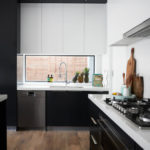 Black and white minimalist kitchen.