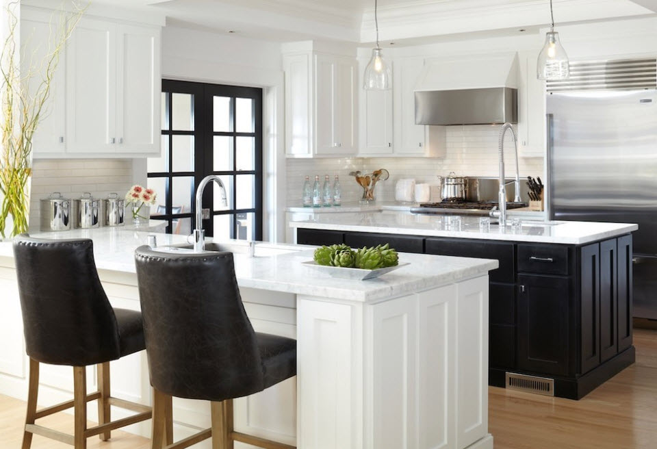 Two kitchen islands in black and white
