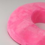 Pink faux fabric cover on ring pillow