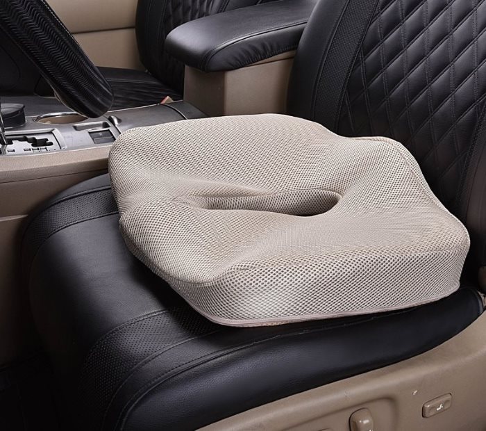 Rectangular orthopedic pillow on a car seat