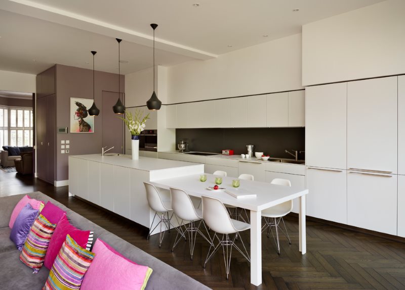 White furniture in the interior of the kitchen-living area of ​​25 sq m