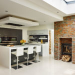 Fireplace in the interior of the kitchen-living room