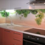 Acrylic apron with photo printing in the kitchen of a panel house