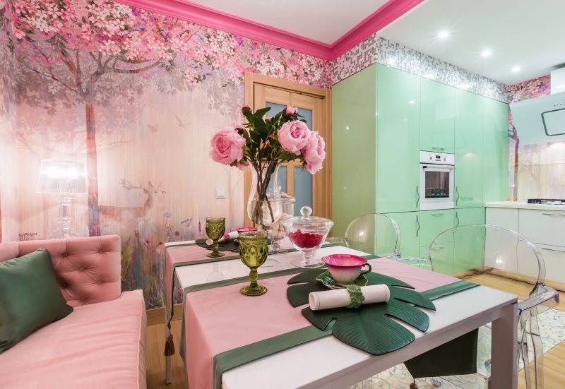 المطبخ الداخلية مع خلفية وردية ومجموعة خضراء