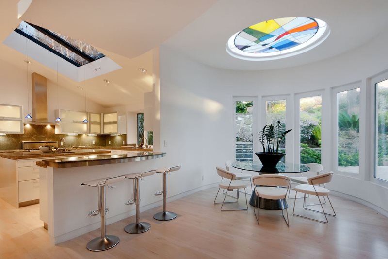 White walls of the kitchen-dining room in a private house