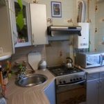 Round sink in the corner of the kitchen