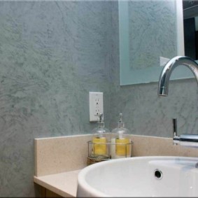 Textured wall surface with decorative plaster