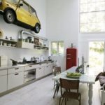 Red fridge in a white kitchen