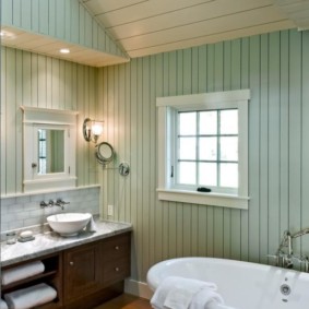 Lining the walls of the bathroom of a country house