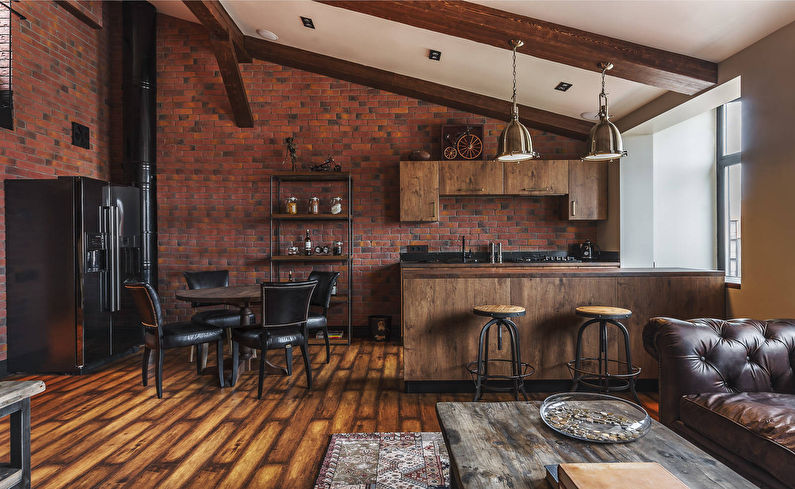 Meubles en bois dans le salon-cuisine de style loft