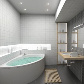 Corner water bath in a room with gray walls