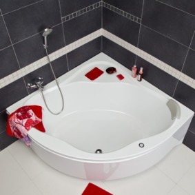 Red towel on a white bath
