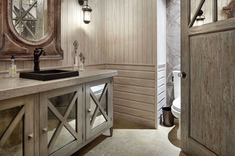 Lining the walls in the bathroom of a country house