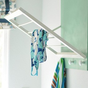 clothes dryer in the bathroom design photo