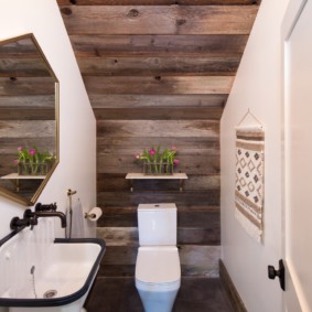 Wooden panels on the toilet ceiling