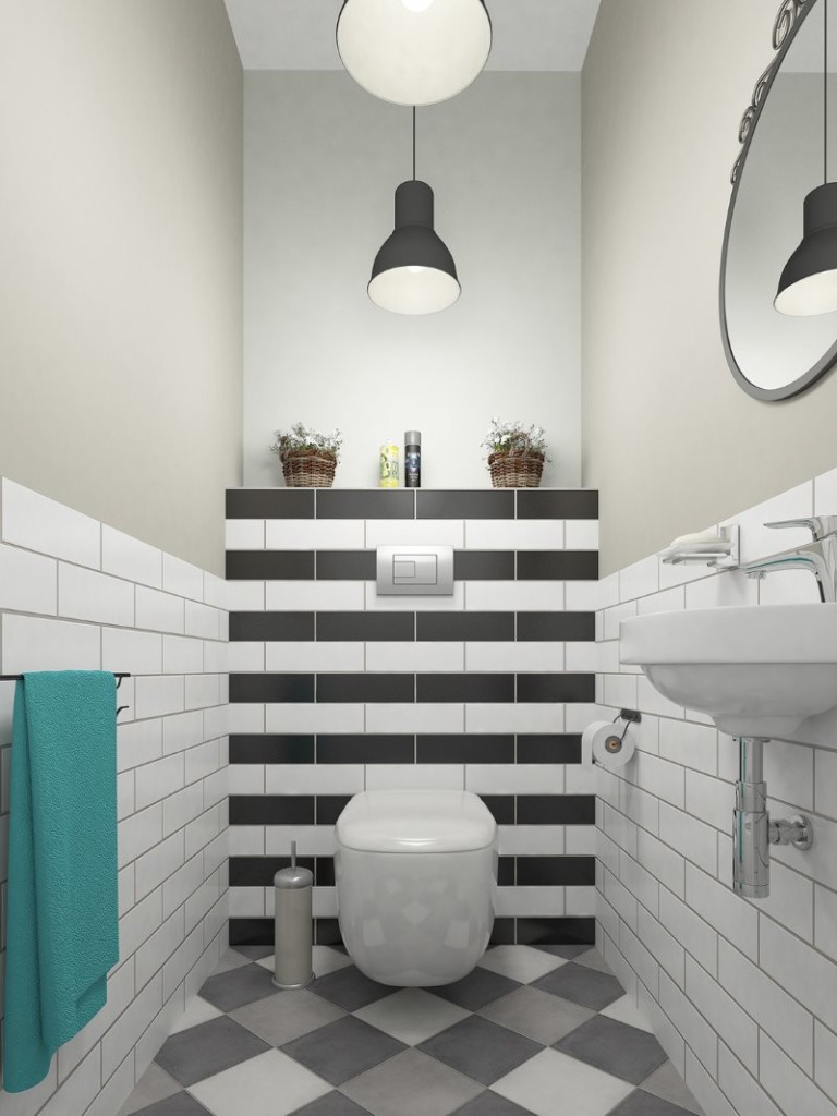 Tegelzwijn op de muur van een compact toilet