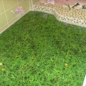 Impresión de fotografías en forma de hierba verde en el suelo del baño.