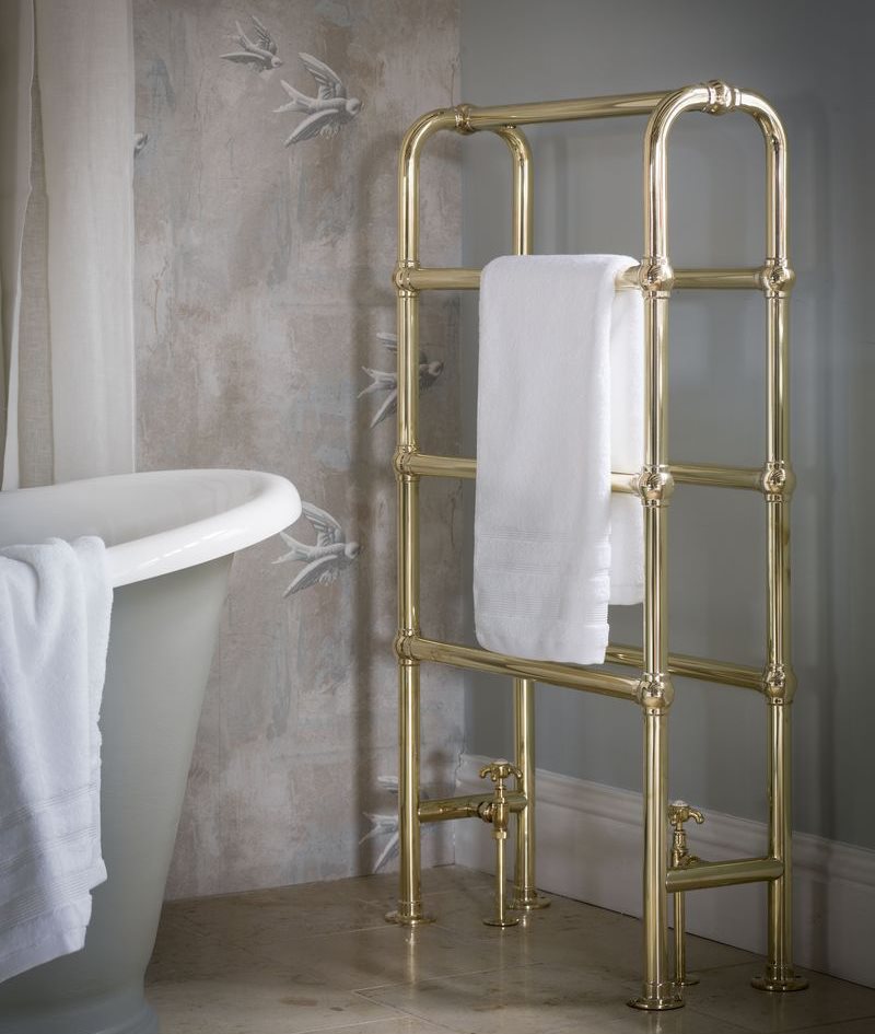 Floor-mounted towel rail in the bathroom of a private house