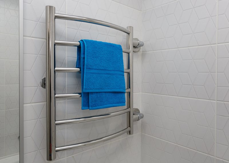 Blue towel on a water-type dryer