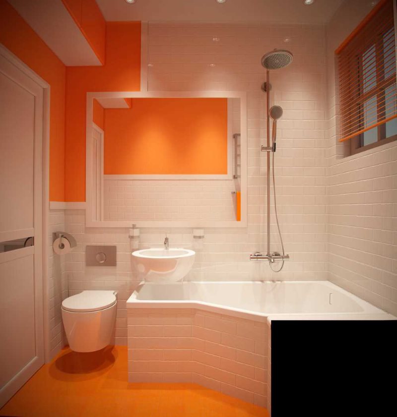 Kolor pomarańczowy we wnętrzu kompaktowej łazienki
