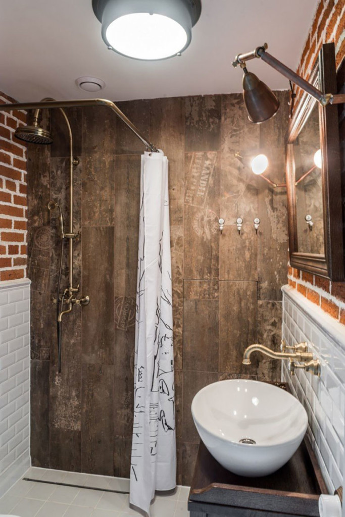 Wooden wall in a compact loft style bathroom